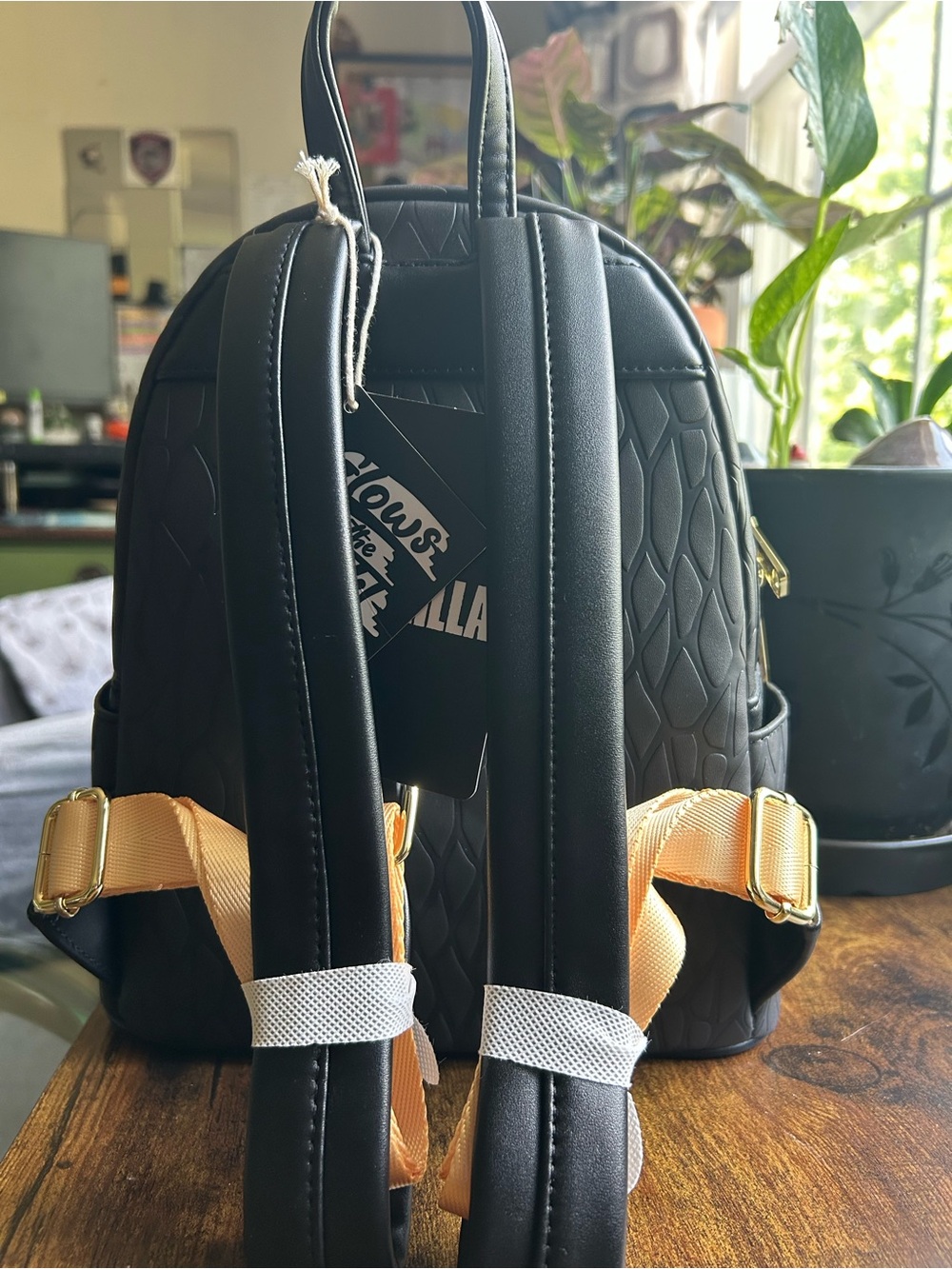 Loungefly Black Godzilla Face Backpack with Yellow and Cream Accents - Picture 2 of 6